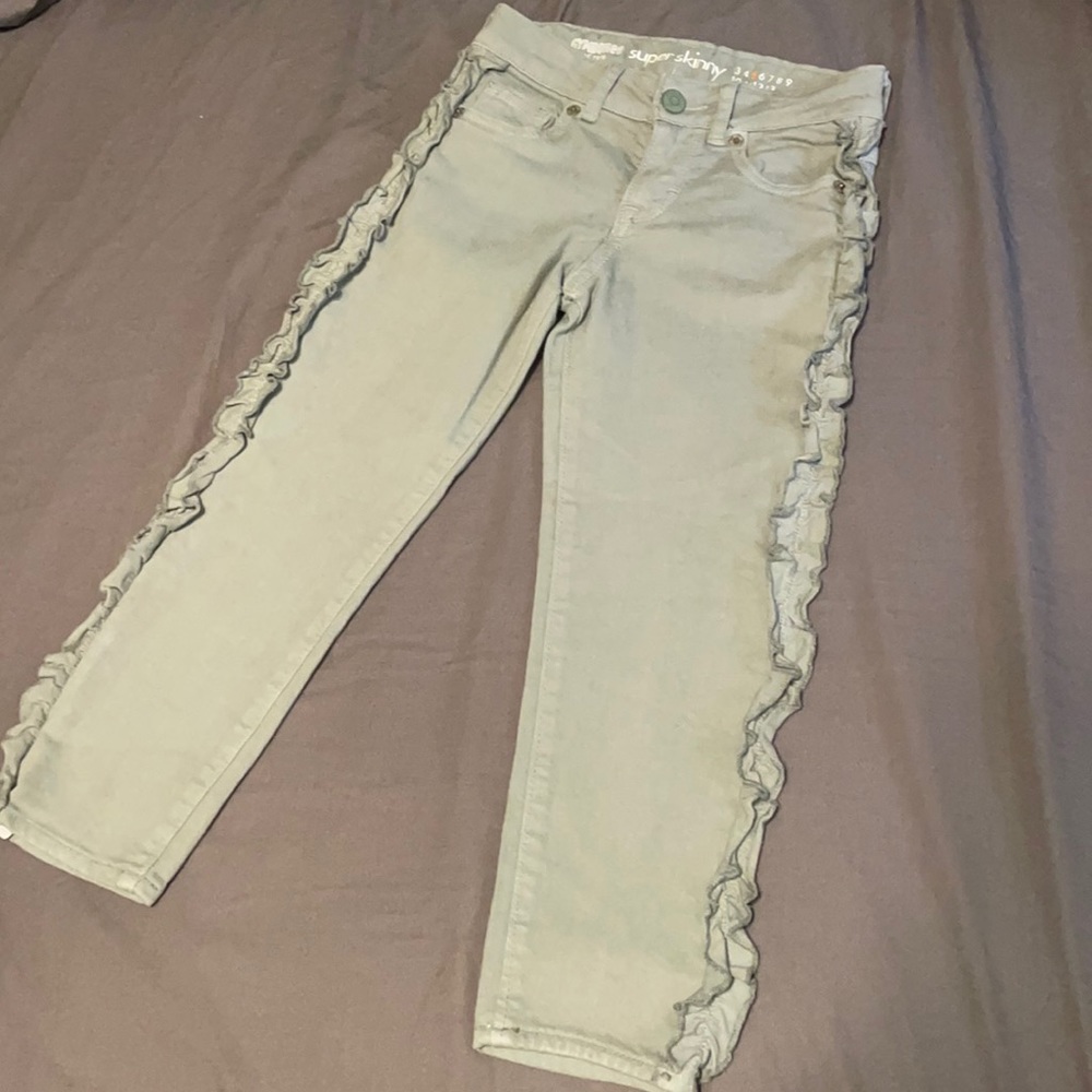 Gymboree NWT girls size 5, green jeans with ruffle detail